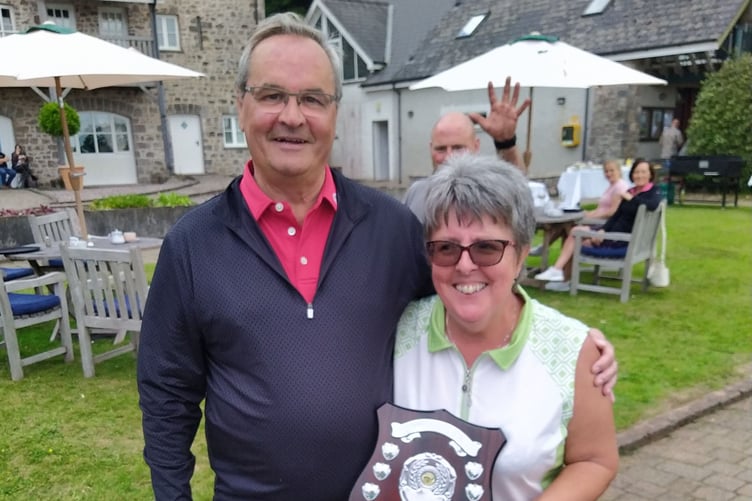Anne Morgan receiving the Ladies’ Past Captains’ Shield from Club Captain Eifion Price