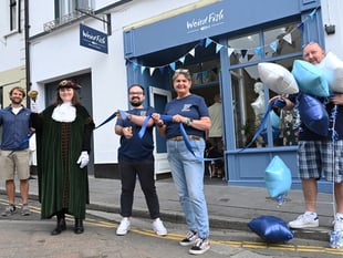 WATCH: Tenby’s Town Crier open new Weird Fish store in the town
