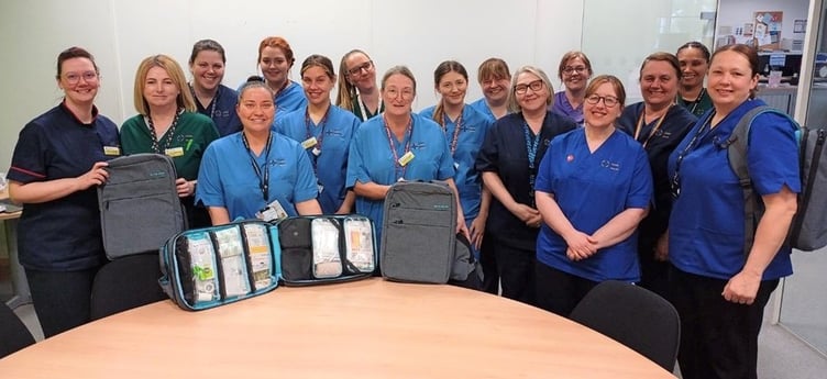 Members of the community nurse team with the new bags.