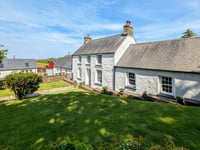 Coastal character property for sale has "superb" sea views