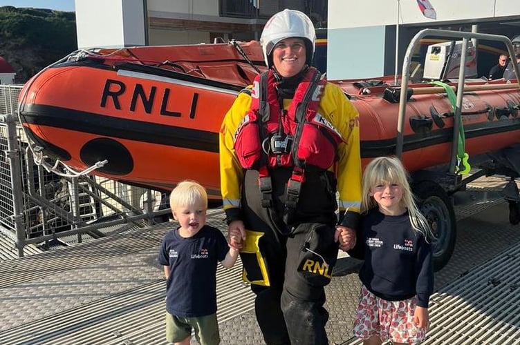 Ellen pictured with children Albie and Isla