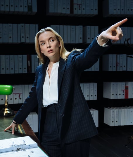 Jodie Comer in PRIMA FACIE by Suzie Miller ;
Directed by Justin Martin ;
Set Design by Miriam Buether ;
Lighting Design by Natasha Chivers ;
Sound Design by Ben & Max Ringham ;
Composer: Rebecca Lucy Taylor ;
Video by Willie Williams for Treatment Studio ;
Production photography by Helen Murray ;
empire street productions; 
Harold Pinter Theatre ;
London, UK ;
25th April 2022 ;
Copyright: empire street productions, photo by Helen Murray