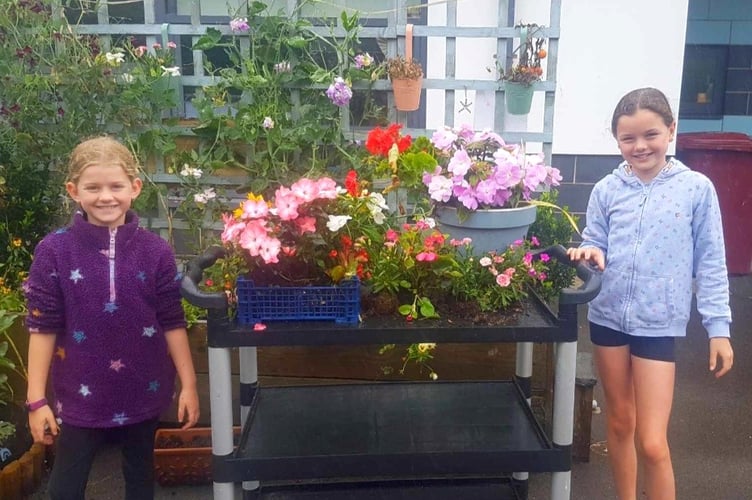 Lottie and Olivia Dashfield from Dolphin Class at Tenby Church in Wales School.