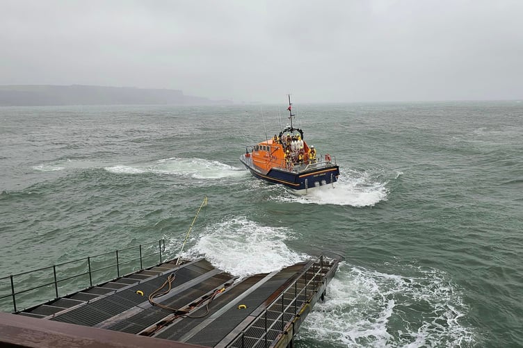 Tenby RNLI Lifeboat launches into the rough sea remnants of Hurricane Ernesto