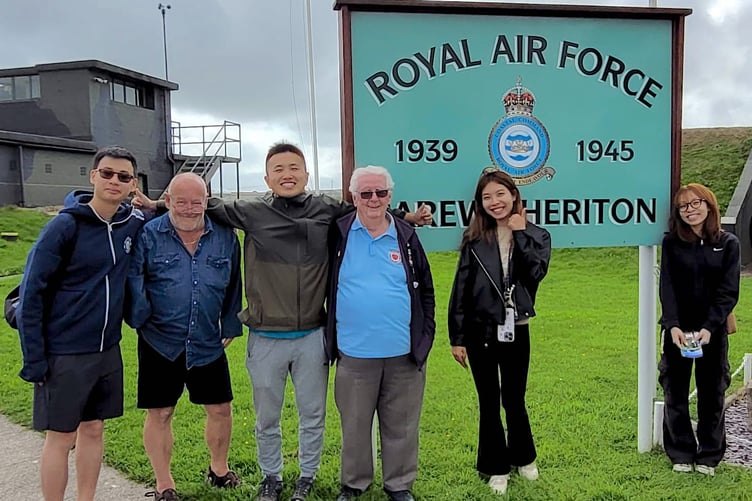 Visitors to Carew Cheriton Control Tower Museum with group members Carl Lawton and Keith Hamer