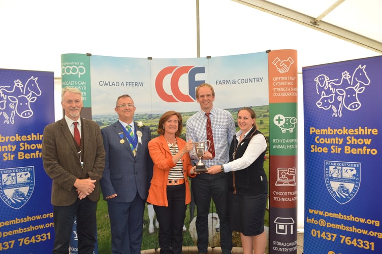 Huw Irranca-Davies, the Deputy First Minister; Adam Thorne, President of the Pembrokeshire Agricultural Society; Eluned Morgan, the First Minister for Wales with the Baron de Rutzen Award winners, Andrew and Jane Phillips.