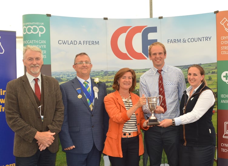 Huw Irranca-Davies, the Deputy First Minister; Adam Thorne, President of the Pembrokeshire Agricultural Society; Eluned Morgan, the First Minister for Wales with the Baron de Rutzen Award winners, Andrew and Jane Phillips.
