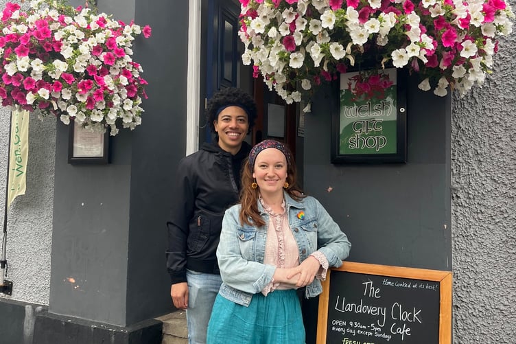 Luke Bailey and Ella Peel next to the entrance to the Clock Tower Café in Llandovery, one of the theatre event venues.