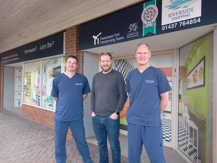 Looking to the future: Cllr Paul Miller, Deputy Leader of Pembrokeshire County Council (centre) with Andy Britton (left) and fellow partner Wayne Jones at the Riverside store which will be home to an expanded Specsavers.