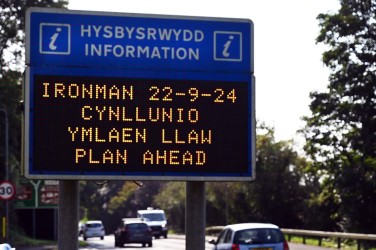 Ironman road closure sign
