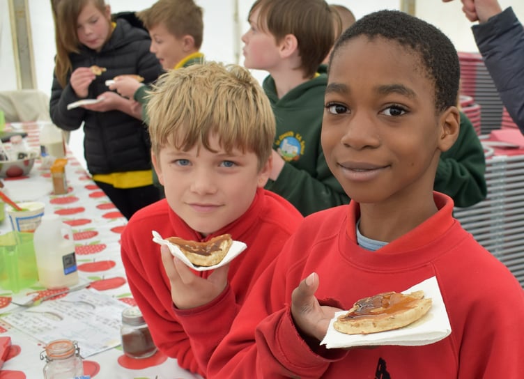 Children with tasty apple pancakes at Narberth Food Festival Education Day