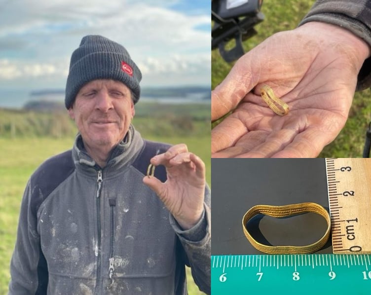 Neil Webb with Middle Bronze Age complete annular gold band, found at Penally, Pembrokeshire in November 2023