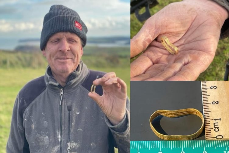 Neil Webb with Middle Bronze Age complete annular gold band, found at Penally, Pembrokeshire in November 2023