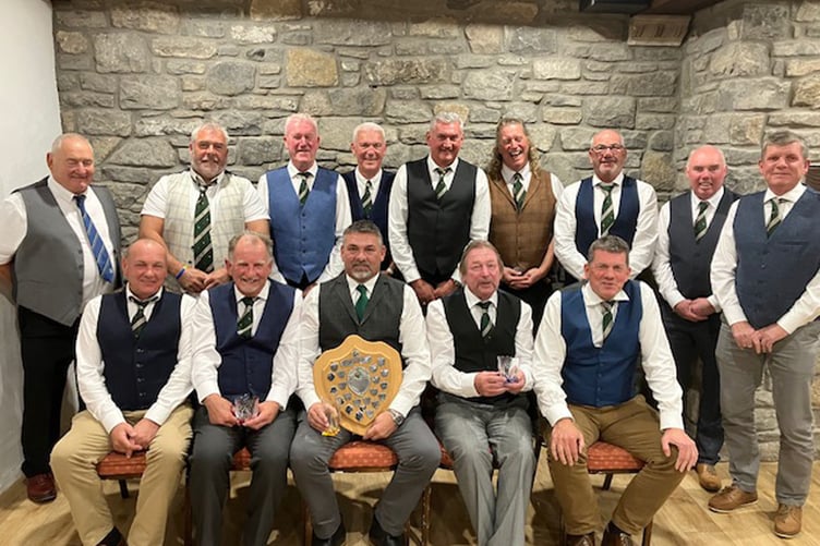 The Saturday Swingers party with tour winner Neil Proctor holding the shield