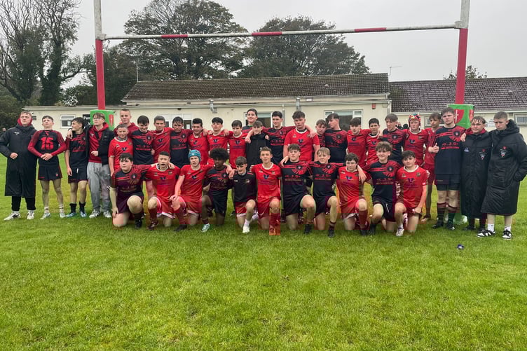 Pembroke and Furnace U15s squads mingle after intense match