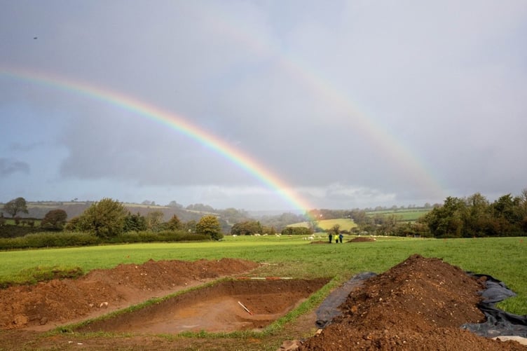 Rainbow over archaeological dig in Pembrokeshire