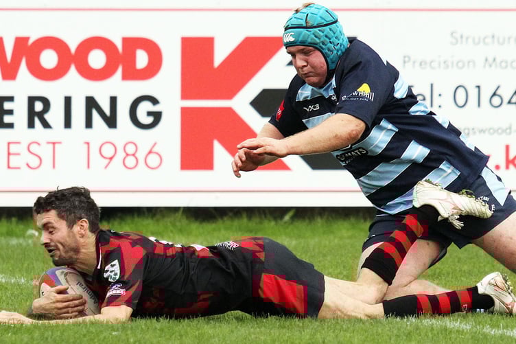 Jordan Asparassa goes over to score the second try for Tenby (Photo: Susan McKehon)