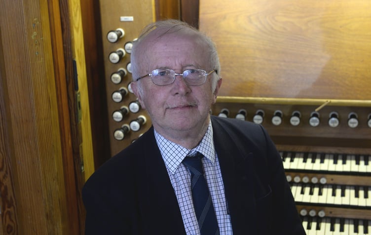 The late Dr John Harrison at the organ of St Mary’s Church, Tenby