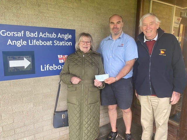 Keith and Dee Williams (Lawrenny Yacht Club and Water Users) presenting a cheque for £240 to Angle Lifeboat at their new base in Milford Haven. The money was raised in a raffle at a recent barbecue at the Lawrenny Arms.
