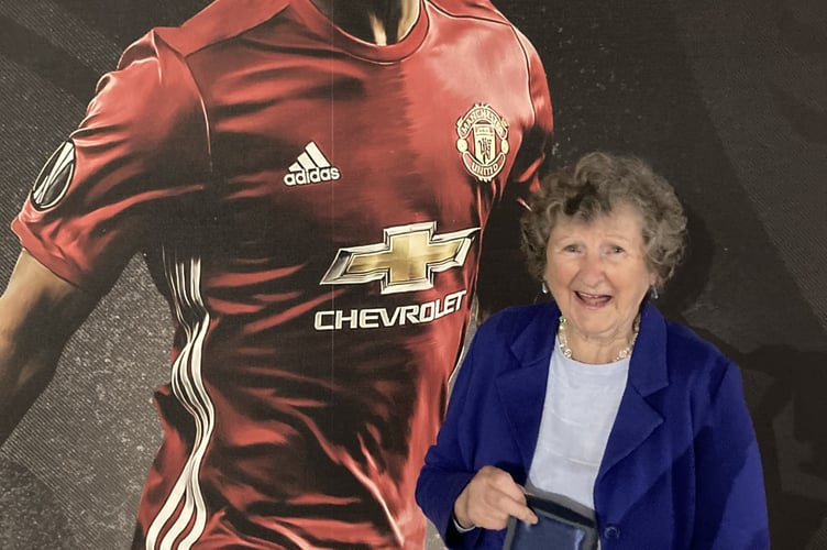 Cllr Rosemary Hayes MBE picking up her ‘Community Champion’ award at the RHS  Britain in Bloom ceremony held at Old Trafford in Manchester recently