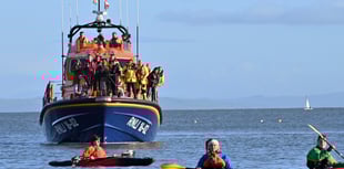 Superhero theme for Tenby’s Boxing Day Swim