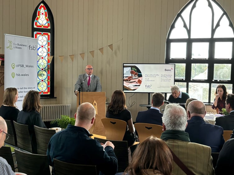 Paul Davies MS opening the event at the Norwegian Church.