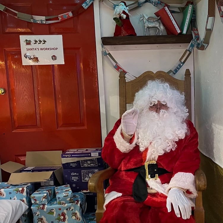 Santa in his grotto at the Christmas Fair