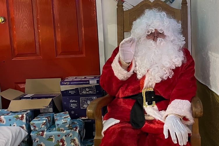 Santa in his grotto at the Christmas Fair