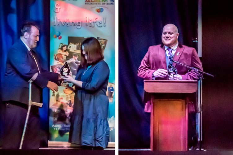 Laurence Blackhall presents 17-year-old Tenby Town Crier Erin Morgan with the Young Hero Award. Winner of the Millbay Homes-sponsored Community Volunteer Award was Shane Roberts.