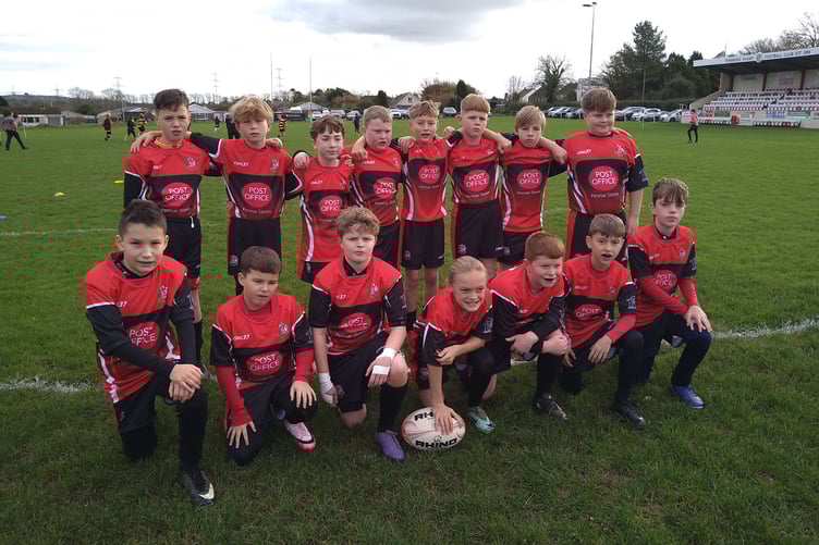 The Pembroke U11s squad proudly wearing for the first time their new kit sponsored by KRS Renovations and Pennar Post Office