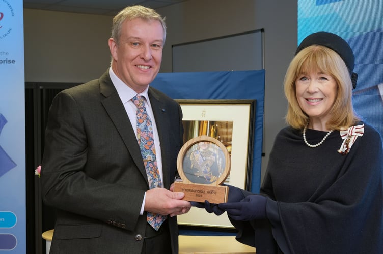 The Lord-Lieutenant of Dyfed, Miss Sara Edwards, presents the King’s Award for Enterprise to Mr Chris Wolsey, Managing Director of FRIO UK.
