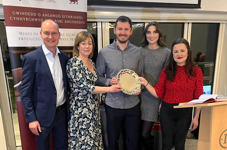 Pictured are Andy, Fiona, Ryan and Sophie Mounsey from Velfrey Vineyard being presented with the award by Sara Hobday of Vin Van Cymru.