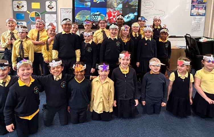 The young marine biologists at Tenby’s St Teilo’s School combined science and art skills to design coral reef animal headbands, which made for a fantastic class photo!