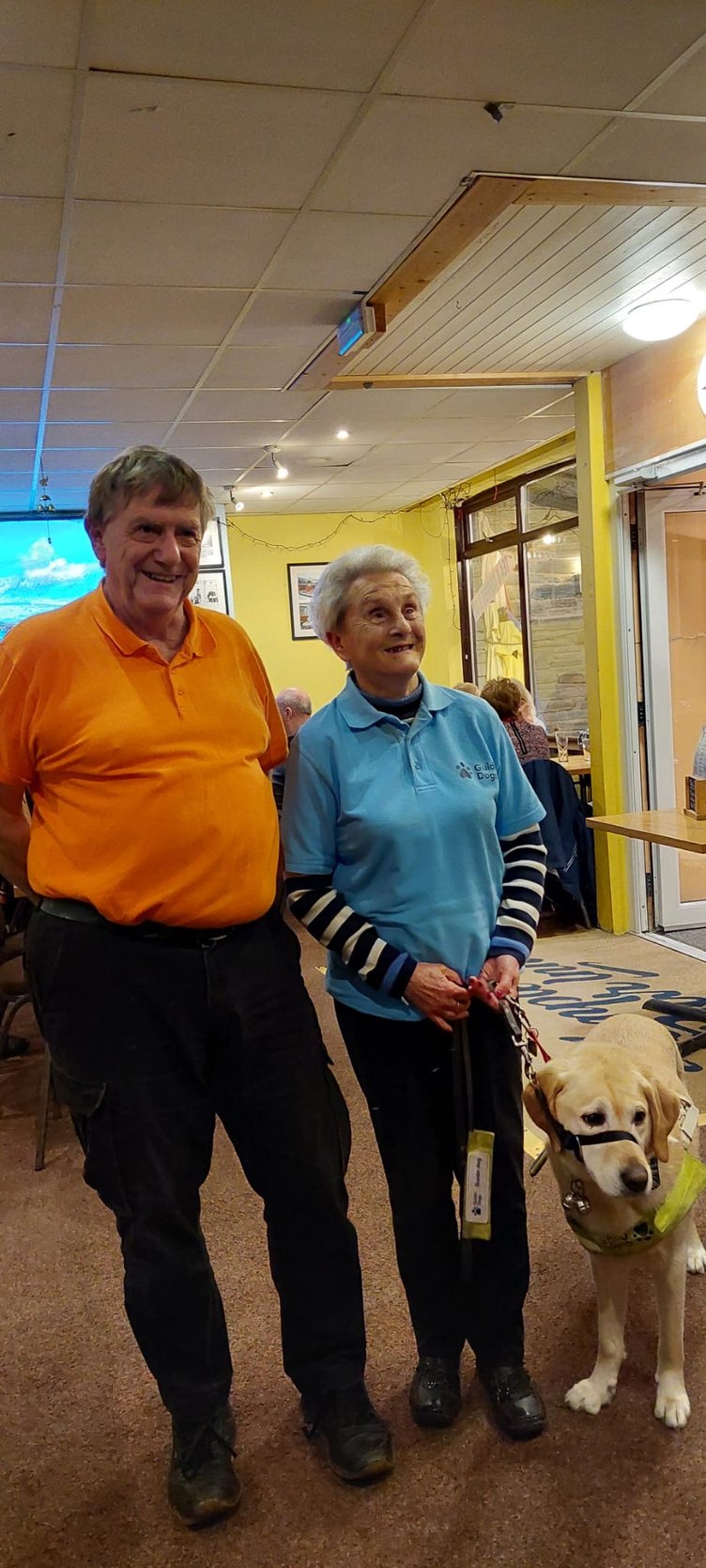 Ian Wilkinson with Eva Rich and guide dog Nancy