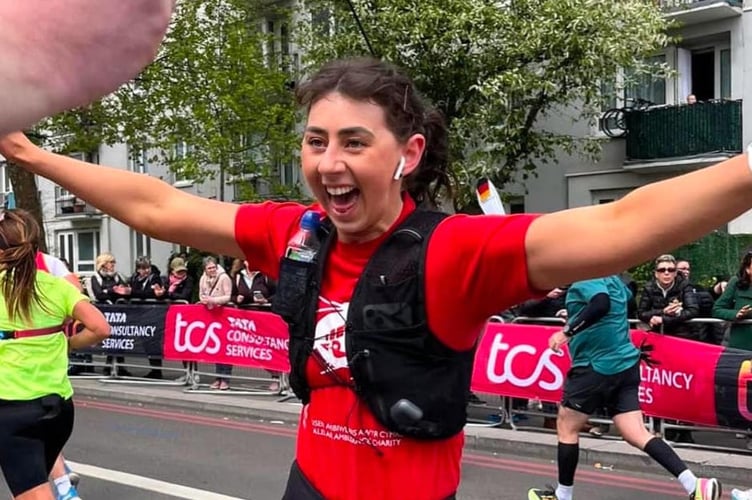 Terrie Savage completing the London Marathon