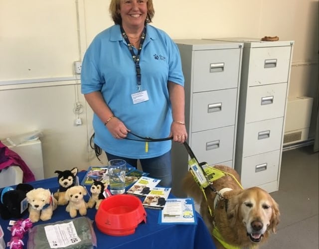 Sue and Henry volunteering for Guide Dogs