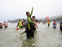 Tenby Boxing Day Swim couple 'take the plunge' with marriage proposal!