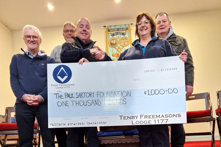 Pictured are Lodge Master David Marshall presenting the ‘big cheque’ to Sandra Dade the fund-raising manager of the Paul Sartori Foundation. Also (I to r) Membership Officer Brian Miller, Charity Steward Steve Thurgood and Secretary David Stewart-Walvin. 