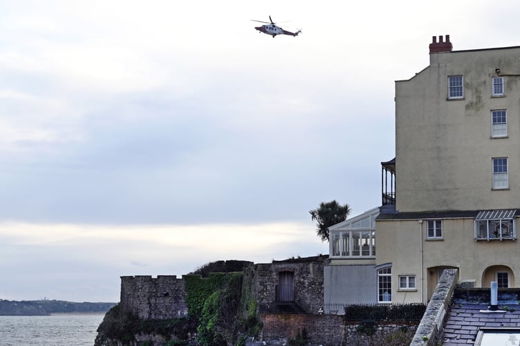 Tenby RNLI and Coastguard were called into action this afternoon (Friday, January 10) after reports that a couple and their dog were cut-off by the tide between the Castle and Paragon beaches.