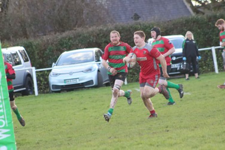 Rhodri Walters breaks away to score