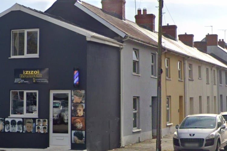 The application for a change of use at Zizo Barbers & Affordable Cars, Cambrian Place, Haverfordwest has been submitted to Pembrokeshire planners. Picture: Google Street View.
