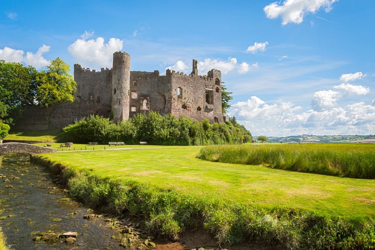 Wide view of the castle from the foreshore
Laugharne Castle 
Cadw Sites