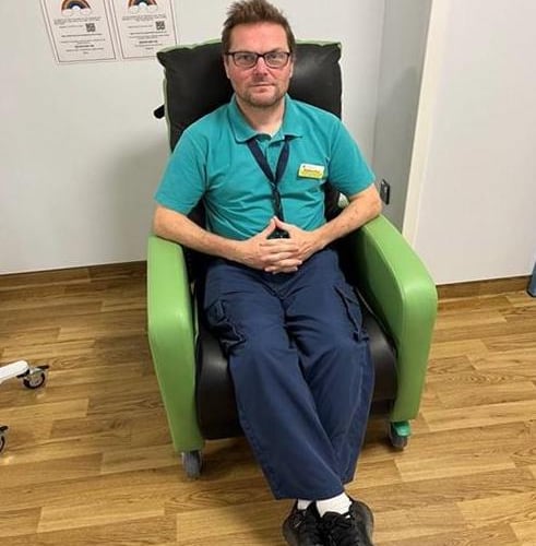 Pictured: Member of staff on one of the recliner chairs