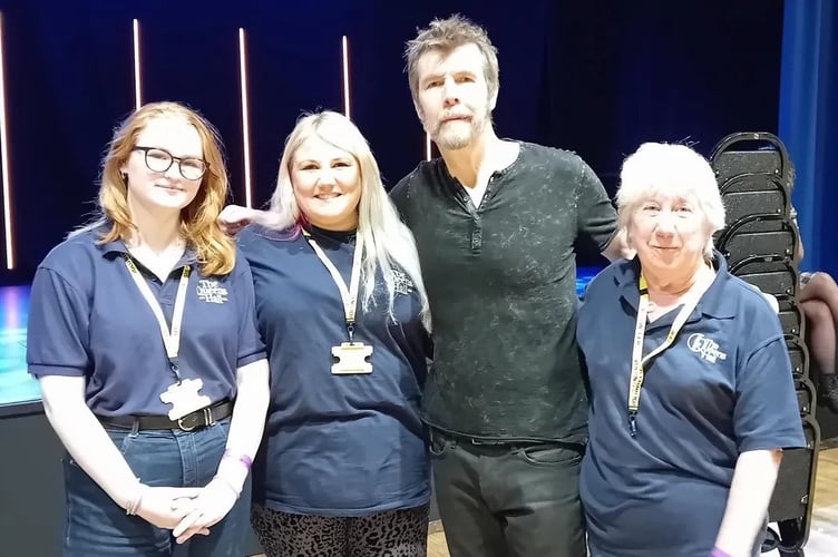 Comedian and presenter Rhod Gilbert pictured with the Queens Hall's Lauren, Geraldine and Betsy