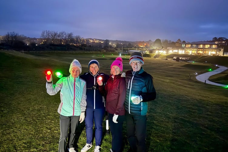 The golfers used head lamps and torches to get around the course