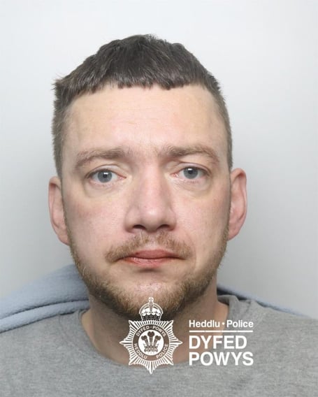 After being arrested, police in-car camera footage showed Clawson removing a cling-film wrap from the back of his trousers and dropping it on the floor of the car while being conveyed to custody.