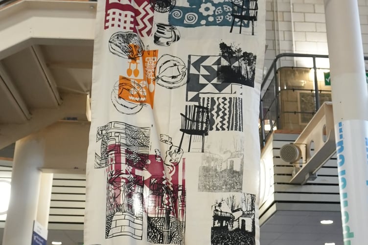The banner is on display in the atrium at Pembrokeshire College