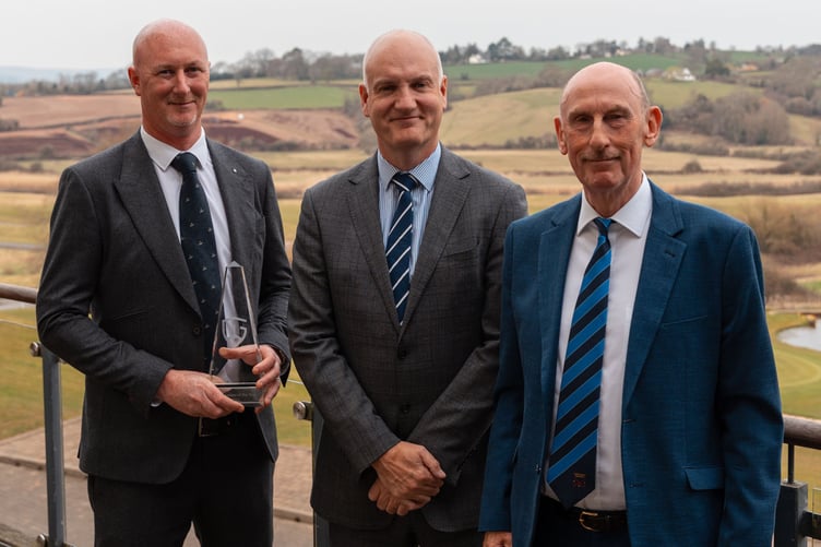 BIGGA Chief Executive Jim Croxton, centre, with Barrie Davies, left, and Matthew Morgan, right, of Cardigan Golf Club.