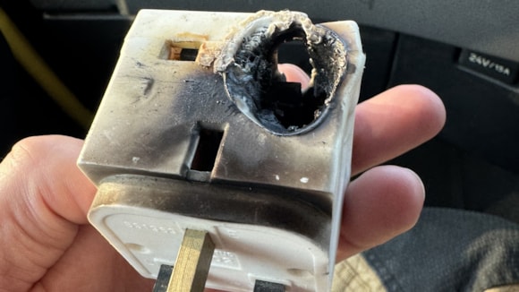 Crews responded to a tumble dryer fire that was caused by the use of a block adapter.