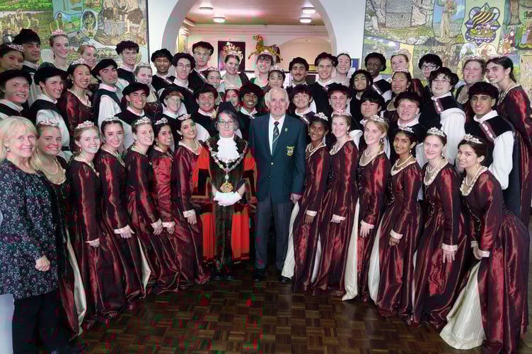 Mayor of Pembroke Cllr Ann Mortensen, and Pembroke and District Male Voice Chairman Huw Morgan, pictured at Pembroke Town Hall with the visiting Mountain View High School Madrigals from California and their musical director, Jill Kenny (left).